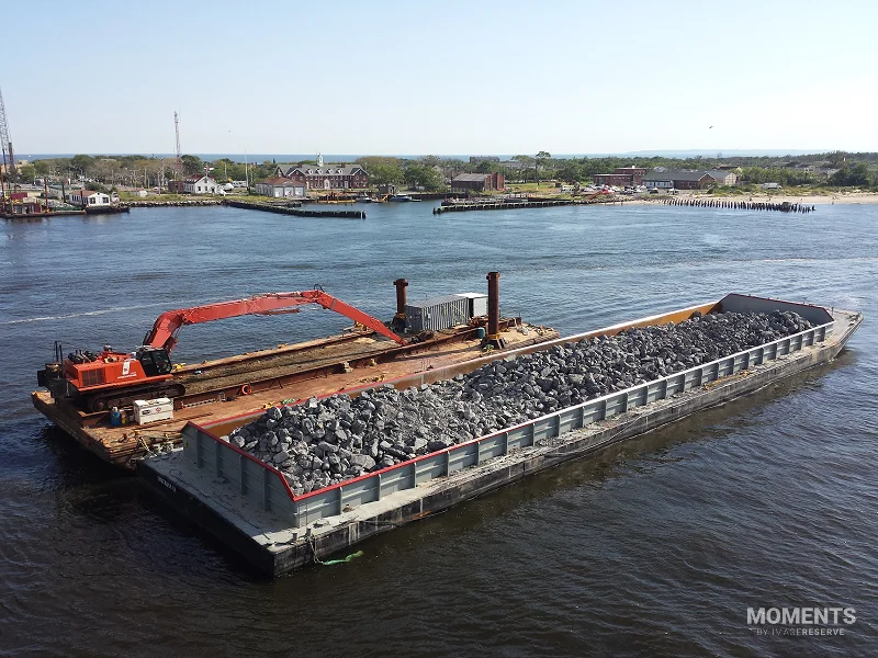 Coastline Reinforcement Project with Rock Barges