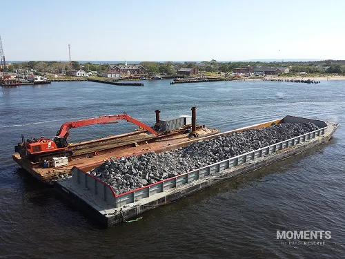 Coastline Reinforcement Project with Rock Barges
